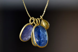 Close up of Triple Colette Mixed Blue Necklace.