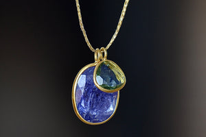 Close up of Double Colette Necklace in Tanzanite and Green Tourmaline necklace by Pippa Small.