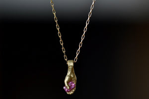 Hand pendant with pink sapphire by Fraiser Hamilton.