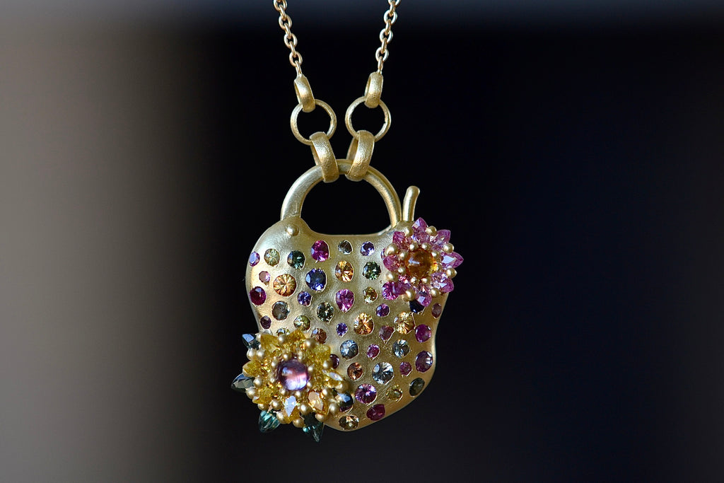 Double Daisy Cluster Padlock Necklace by Polly Wales up close.