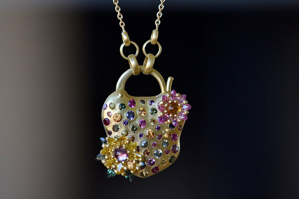Double Daisy Cluster Padlock Necklace by Polly Wales up close.