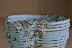 Detail  of Hyejeong Kim Torn Vase #16 in blue celadon.