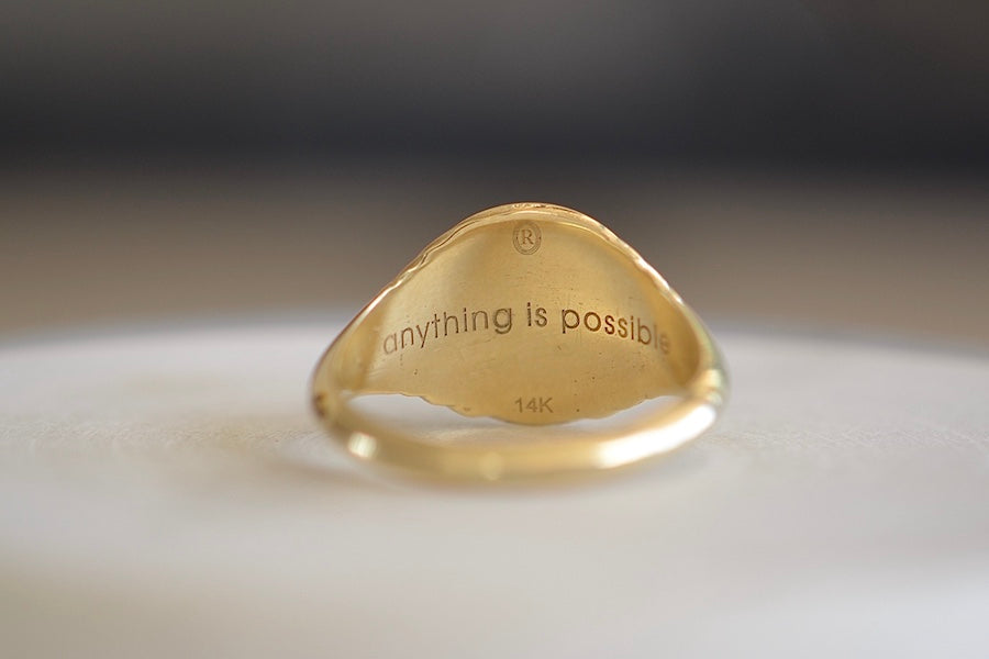 
            
                Load image into Gallery viewer, Engraving on Baby Fantasy Signet ring in Flying Pig by Retrouvai.
            
        