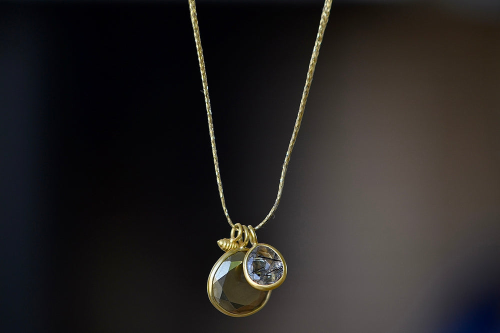 Double Colette Necklace in Pyrite and Rutilated Quartz by Pippa Small on gold string.