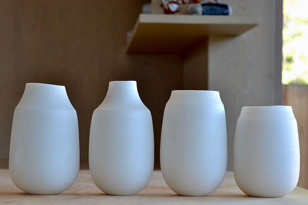 Four different vases with neck by Lilith Rocket in porcelain.