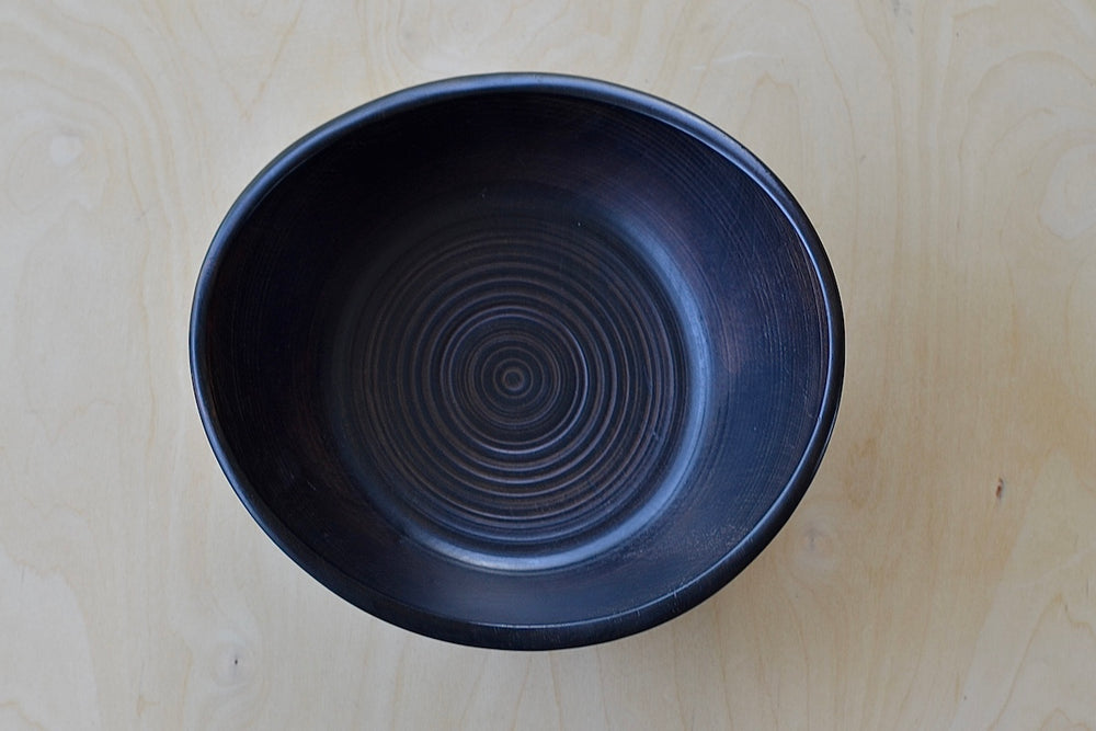 Birds eye view of view of Circle Factory wood turned bowl in Black Cherry by George Petersen.