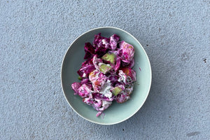 Potato and beet salad in Shallow Plates or bowls in celadon blue by Korean ceramicist Hyejong Kim, Loewe Craft Prize finalist.