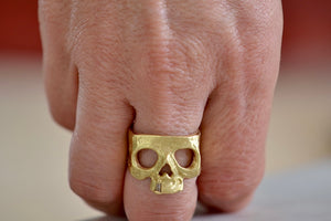 Wearing the snaggle tooth skull ring by Polly Wales.