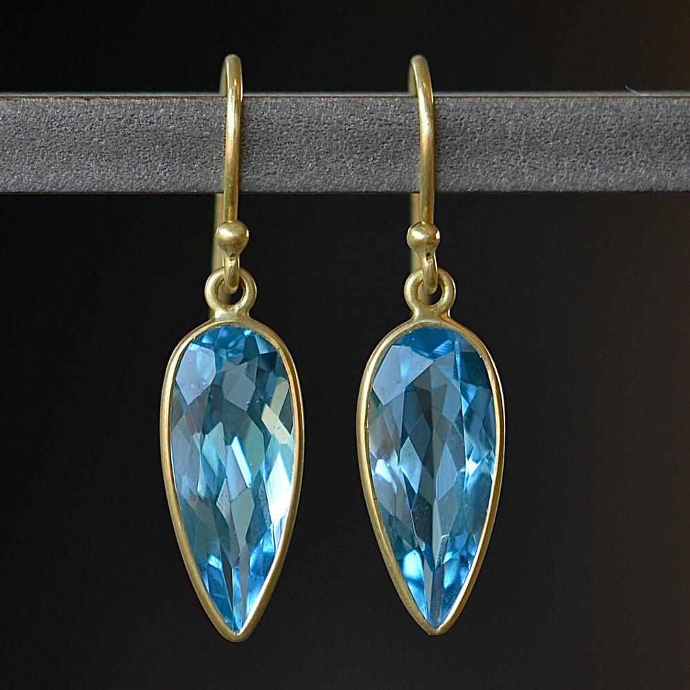 Medium leaf earrings by Tej Kothari in Blue Topaz.