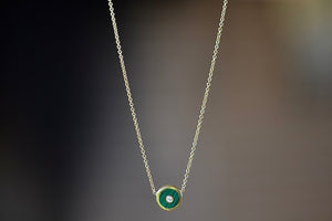 
            
                Load image into Gallery viewer, Mini Compass Pendant Necklace in Green Malachite by Retrouvai with round white diamond accent on 16&amp;quot; 14k yellow gold chain.
            
        