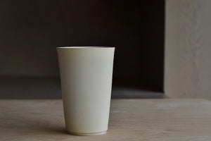 Hyejeong Kim Cream Vase is a A Loewe Craft Prize finalist. Hand thrown porcelain in matte white glaze. Signed and one of a kind.