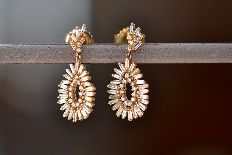 
            
                Load image into Gallery viewer, Pear Drop Dangle Earrings by Suzanne Kalan are a frame of bezeled round white diamonds (.15CT) surrounded with white diamond baguettes (.8CT) dropped from a stud frame with diamonds and baguettes. Wedding or special event earrings.
            
        