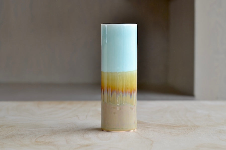 Light blue and brown cylinder vase by Yuta Segawa.