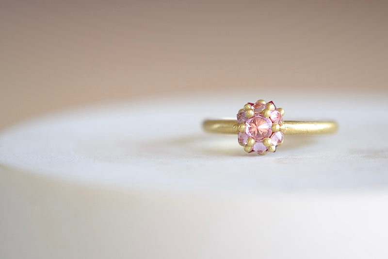 Small Sputnik Ring by Polly Wales is a domed half sphere in 18k yellow gold with encrusted and inverted pink and fuchsia sapphires around the circumference on a 1.5mm gold halo band is a smaller version of the original Sputnik signet or pinky ring. Recycled gold. Cast not set. Handcrafted and handmade in Los Angeles.