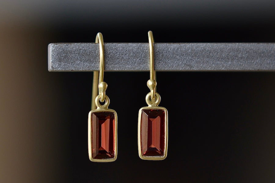 
            
                Load image into Gallery viewer, Extra Small XS Baguette Earrings in Garnet by Tej Kothari are Smooth, translucent and rectangular Garnet baguettes set in 18k yellow gold with gold ear wire.
            
        