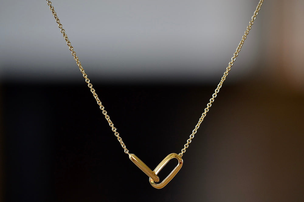 Linked Necklace by Lizzie Mandler is made out of two connected knife edge oval clip links in 18k yellow gold on a gold chain. Made in Los Angeles.