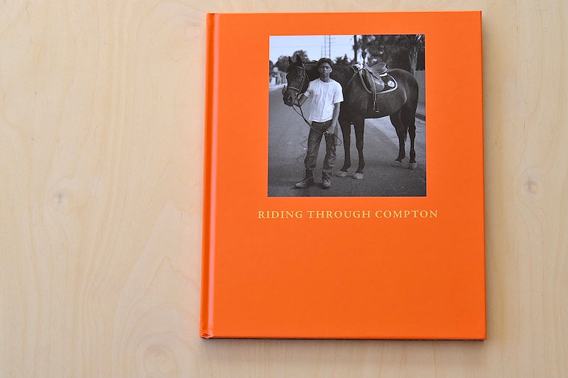 Riding Through Compton is a  Monograph depicting youth program teaching how to ride horses and responsibility. Grace, joy exudes from photographs.