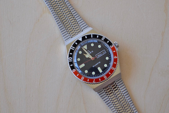 Timex Q Diver Reissue Watch Black Face, Black and red bezel 38mm TW2U613002V silver bracelet 