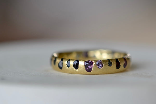 Polly Wales Black with Teal and Purple sapphires Confetti Band in size 7.5 that is Cast not Set.