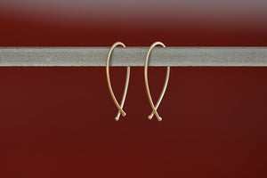 
            
                Load image into Gallery viewer, Carla Caruso 14k Yellow Gold Ribbon Hoops in Small
            
        