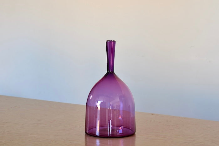 Angelic Bottles by Joe Cariati are mouth blown  Freeblown by glass master Joe Cariati in his Southern California studio, these bottle-form vases evoke the more mass produced mid-century ones that inspired them  wide ultra violet purple.ultra violet
