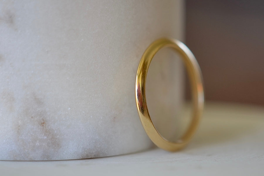 Petite Knife Edge Wedding Band by Lizzie Mandler 1.7mm in 18k yellow gold is handmade in Los Angeles.