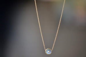 
            
                Load image into Gallery viewer, Mini Compass Pendant Necklace in Dark Mother of Pearl by Retrouvai with round white diamond accent on 16&amp;quot; 14k yellow gold chain.
            
        