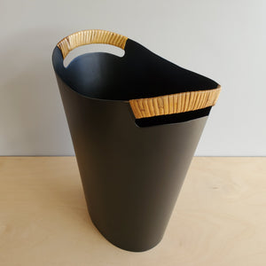 
            
                Load image into Gallery viewer, The Ørskov Wastebasket is made in matte black steel with cane wrapped handles and is 13&amp;quot; tall. It was designed by Grethe Kornerup-Bang in Denmark and is still  produced by Torben Orskow.
            
        