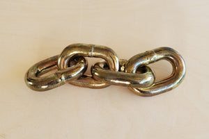 
            
                Load image into Gallery viewer, Aubock Paperweight &amp;quot;Chain&amp;quot; 5072 in brass.
            
        