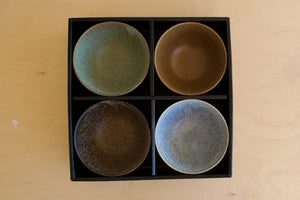 Set of 4 ceramic Japanese Bowls in a box.
