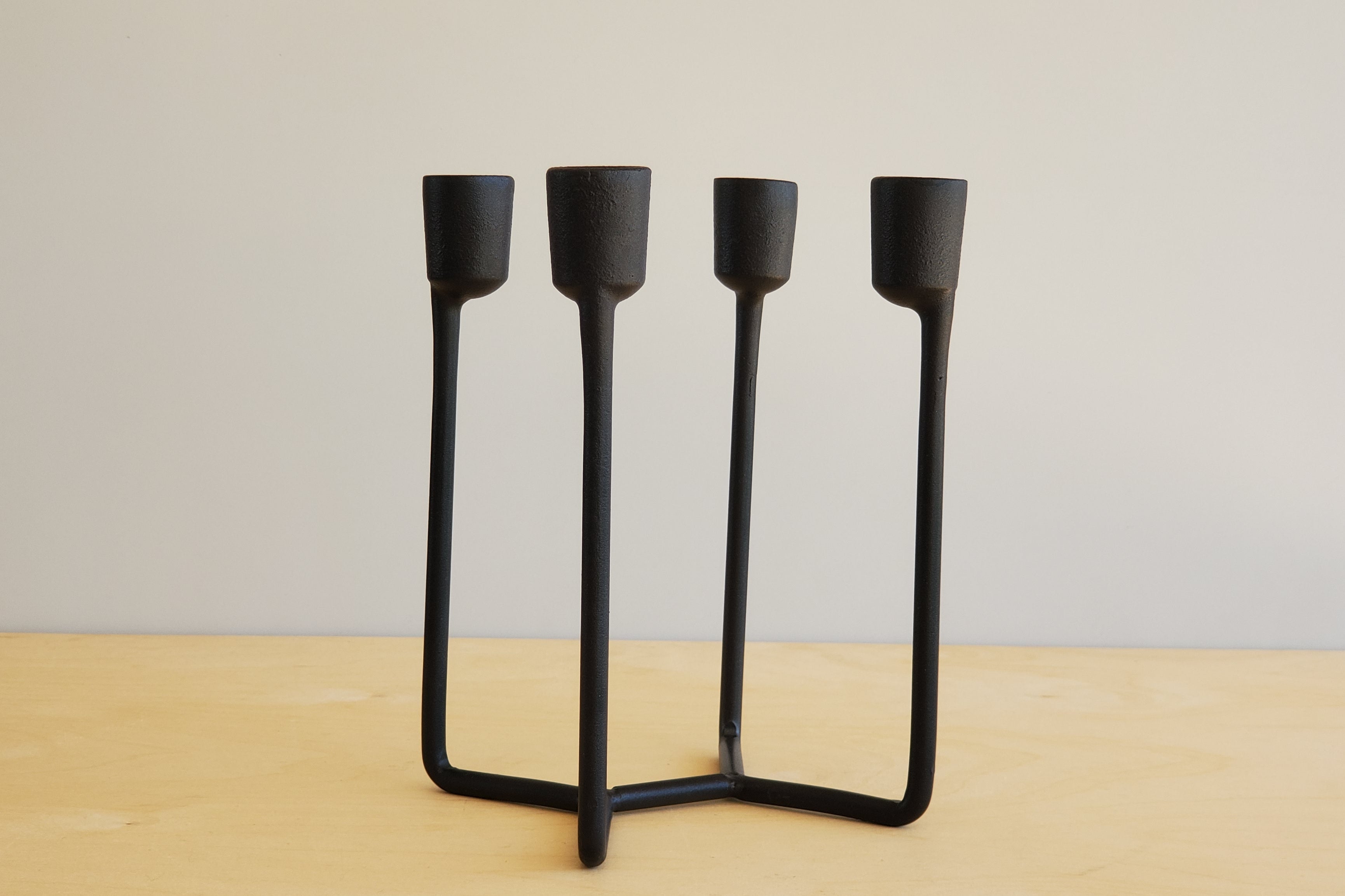 Heima Cast Iron Candle Holder in Black OK the store