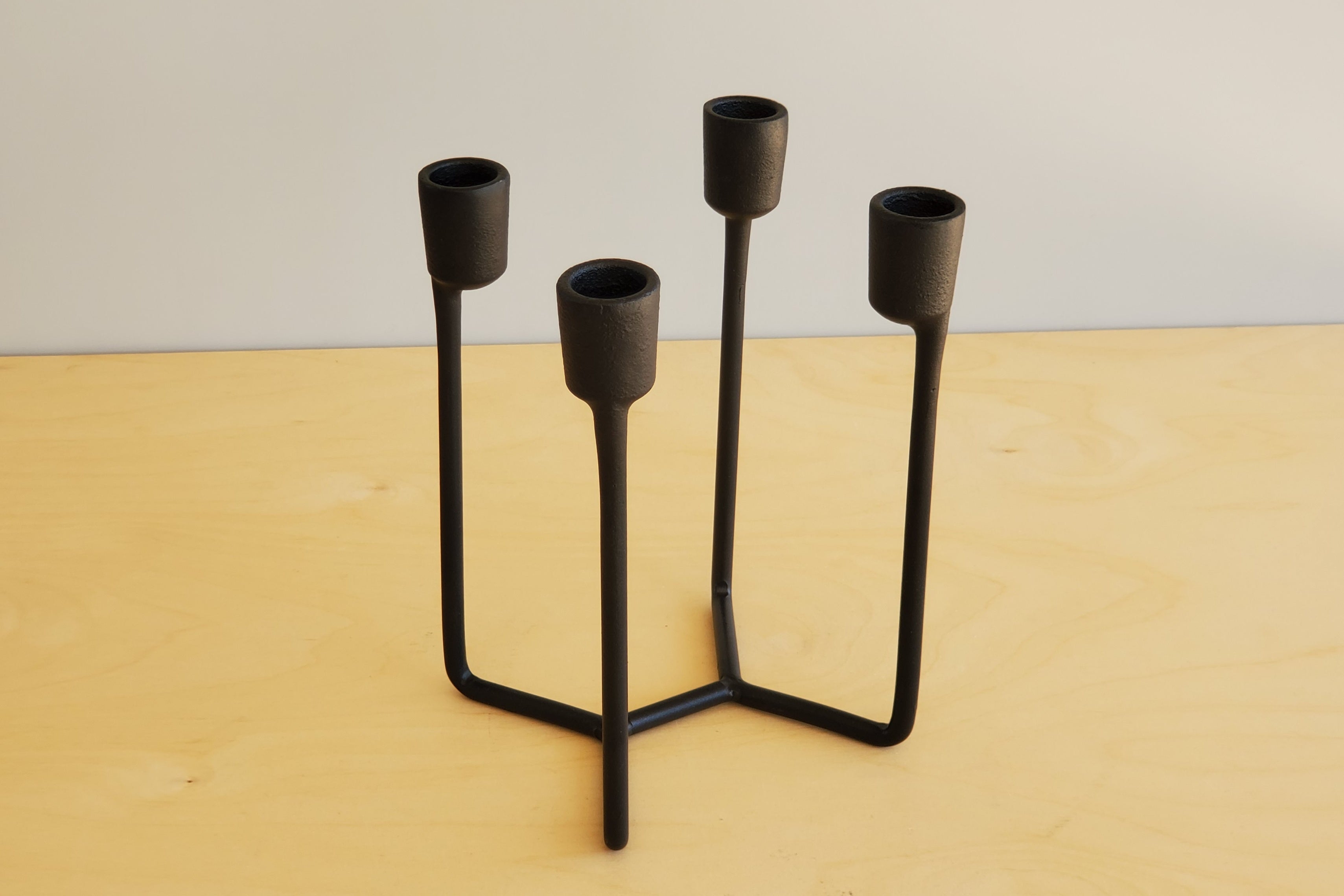 Heima Cast Iron Candle Holder in Black OK the store