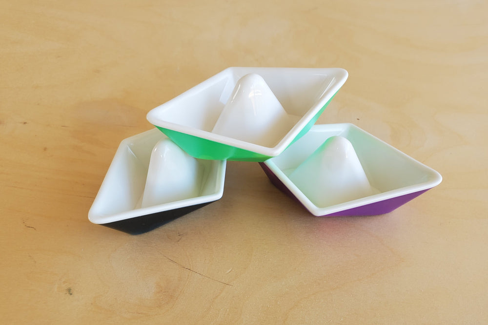 Kid O Color-changing origami boats for bathtub play.