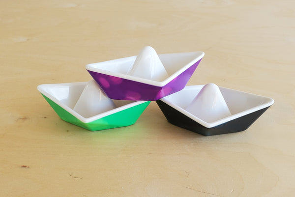 Kid O Color-changing origami boats for bathtub play.