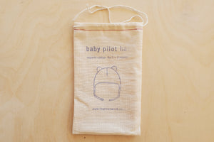 
            
                Load image into Gallery viewer, Baby Pilot hat by Fog Linen.
            
        
