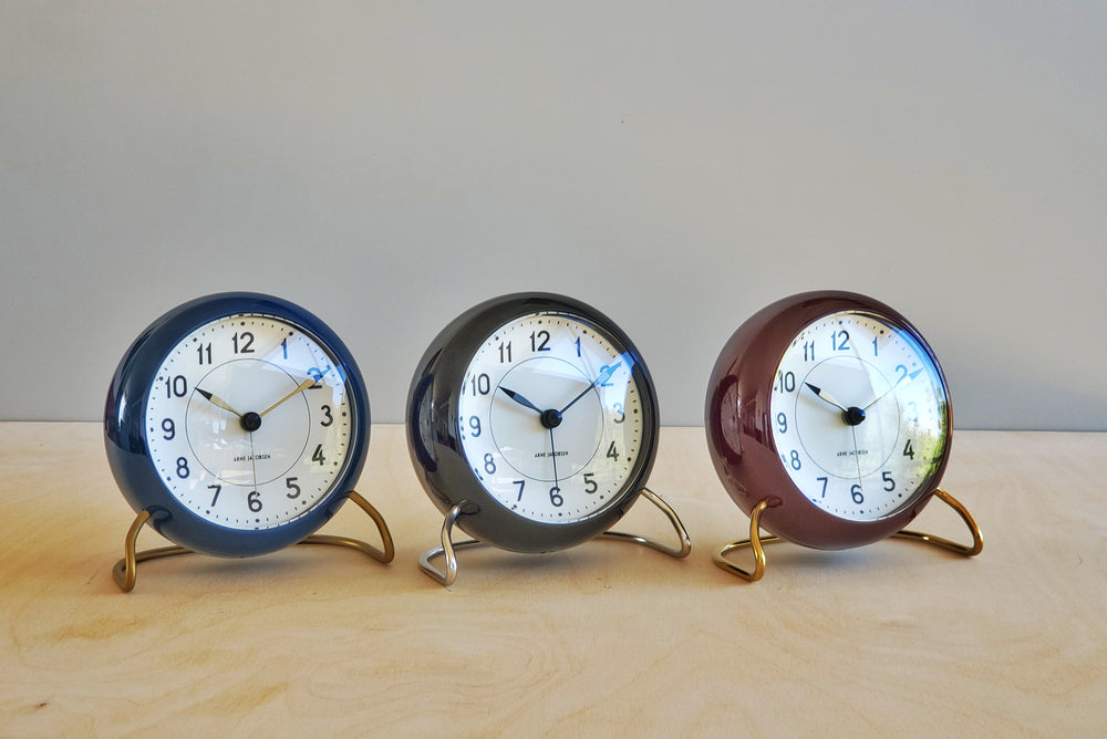 Classic Arne Jacobsen "AJ" Alarm Clock in blue, black or burgundy red AA batteries not included. 