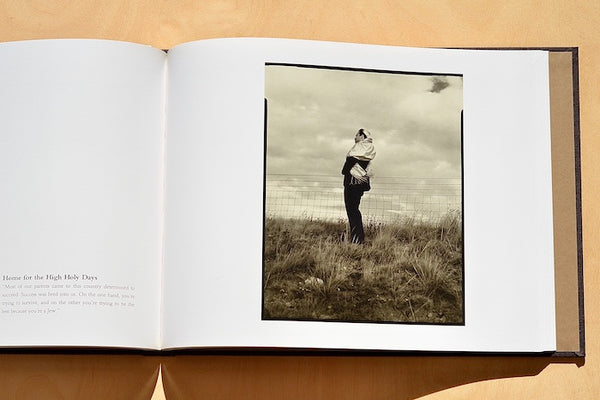 Photograph of man in prayer from The Jews of Wyoming: Fringe of the Diaspora by Penny Diane Wolin.