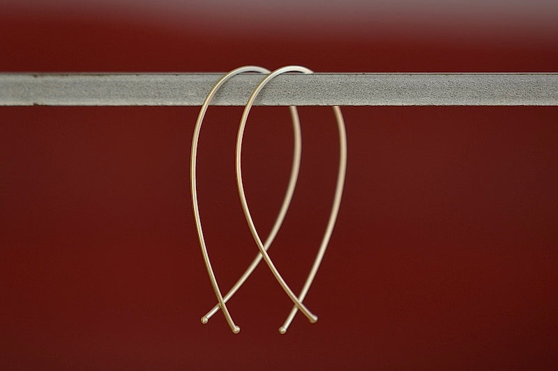 
            
                Load image into Gallery viewer, Carla Caruso 14k Yellow Gold Ribbon Hoops Large.
            
        
