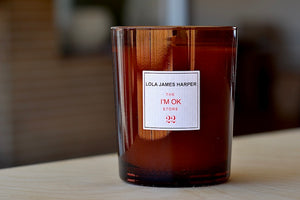 I'M OK special candle by Lola James Harper.