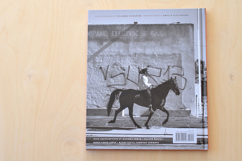 Riding through Compton by Melodie McDaniel.