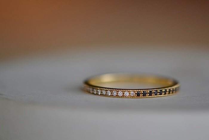 
            
                Load image into Gallery viewer, Othello Stackable Ring Eternity Band by Lizzie Mandler which is a classic eternity band with beautiful diamond pave, half in black and half in white. Handcrafted in Los Angeles.
            
        