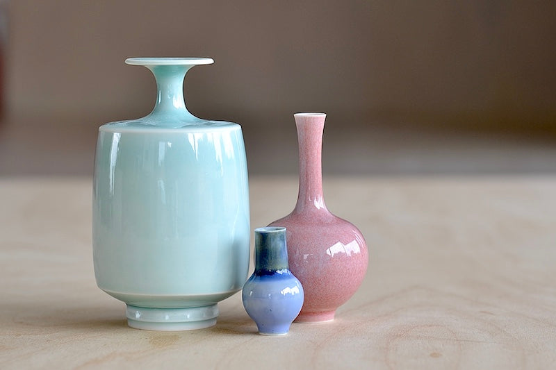 
            
                Load image into Gallery viewer, Miniature Hand Thrown Ceramic Vase Trio in Light Blue, Pink and Blue by Yuta Segawa.
            
        