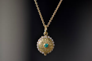 
            
                Load image into Gallery viewer, Close up of Emerald Pendant Locket with pave diamonds by Arman Sarkisyan.
            
        