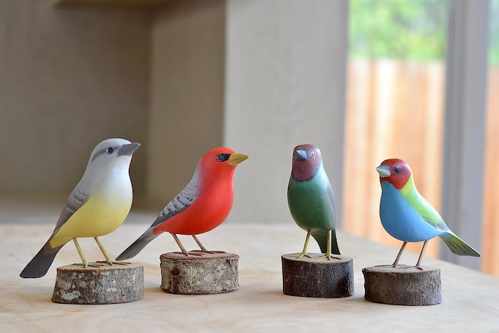 Four wooden an colorful birds from Brazil. Fair trade and handmade.