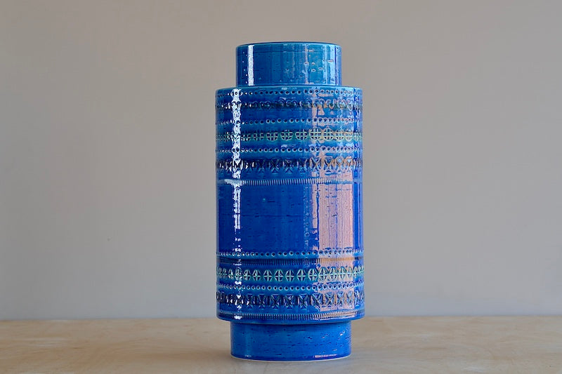 Rimini Blu Plinth vase is Current production of the "Rimini Blu" series. Designed between 1955 and 1965 by by Aldo Londi. This vase is hand made in Italy and one of a kind, made in ceramic earthenware and with a blue glaze.