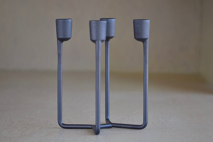 Heima Cast Iron Candle Holder in Black OK the store