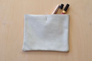 
            
                Load image into Gallery viewer, Dosa Wallet Large is a Standard Issue and classic smooth white wallet or makeup pouch in 100% leather with metal logo and zipper. 
            
        