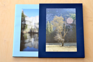 Yosemite by Catherine Opie is a slipcovered limited edition of 350 coffee table  book of photographs from Yosemite National park, in focus and out of blurred, capturing and breaking down its majestic nature from Nazraeli Press. 