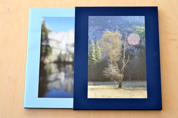 Yosemite by Catherine Opie is a slipcovered limited edition of 350 coffee table  book of photographs from Yosemite National park, in focus and out of blurred, capturing and breaking down its majestic nature from Nazraeli Press. 