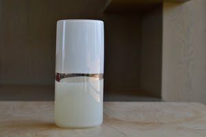 View form the side. Lattimo White & Ivory Flat Cylinder Vase Small designed by Caleb Siemon & Salazar, who trained with Pino Signoretto. Italian Milk glass.